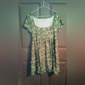 Short Green Dress With Flowers On It